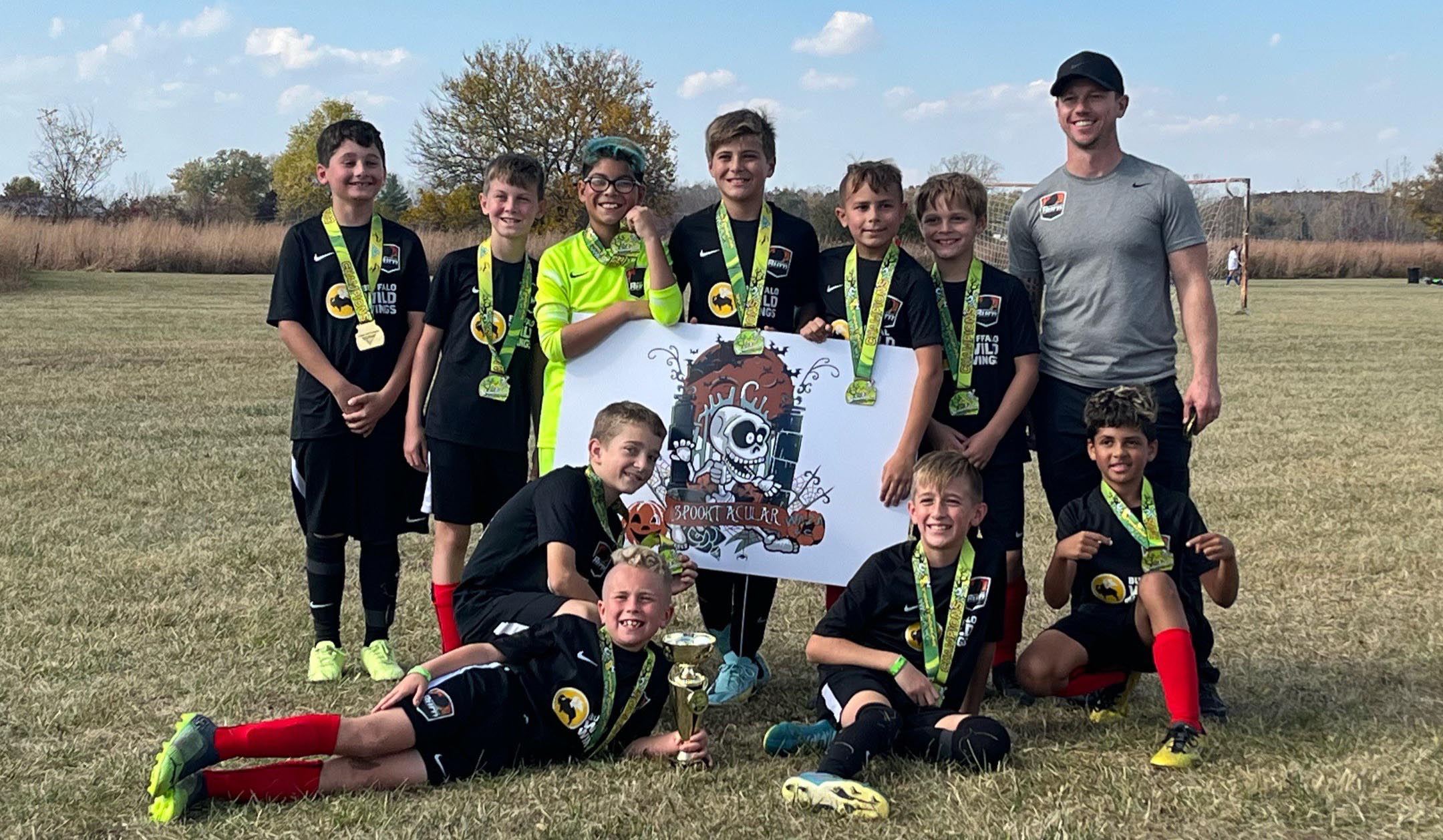 12 Boys White are Waza Spooktacular Champions! Michigan Burn Soccer